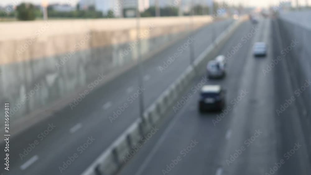 Abstract bokeh of car headlights in the morning city road traffic Abstract bokeh of car headlights in the morning city road traffic