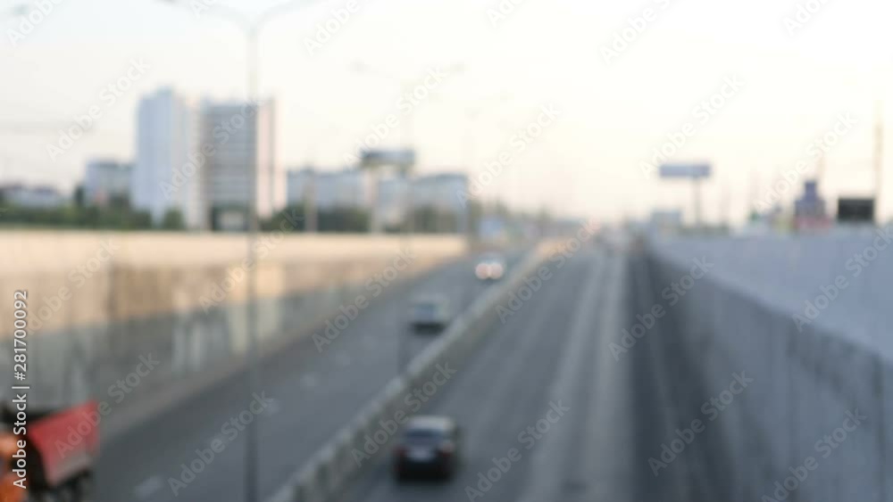 Abstract bokeh of car headlights in the morning city road traffic Abstract bokeh of car headlights in the morning city road traffic