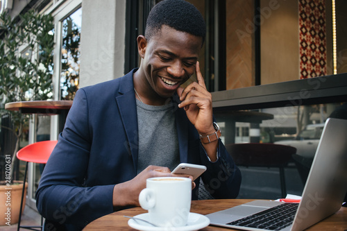 Business man working from a cafe