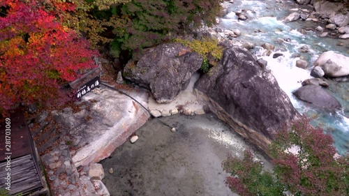 Hot spring of Shinhotaka in autumn, Japan photo