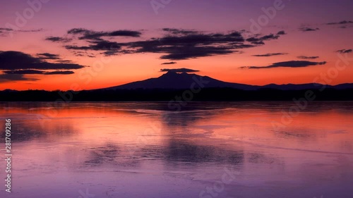 Mountain and lake at sunrise photo