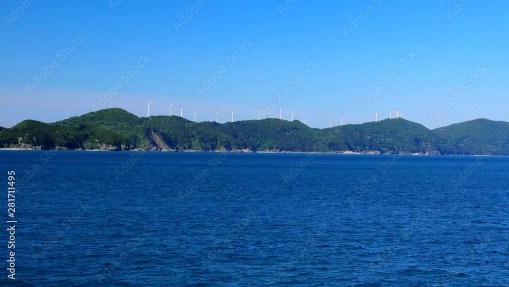 View of sea and wind turbines, Ikata, Nishiuwa, Ehime, Shikoku, Japan View of sea and wind turbines, Ikata, Nishiuwa, Ehime, Shikoku, Japan