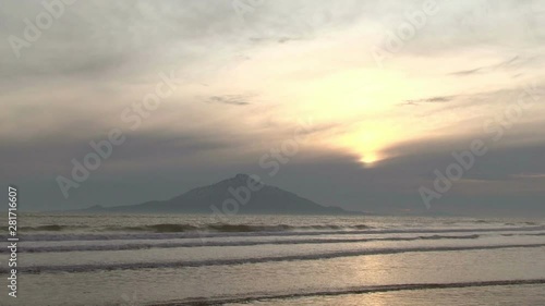 Rishiri Island at sunset seen from the Sarobetsu Coast photo