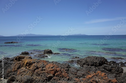 The blue ocean and rocks in Tasmania Australia