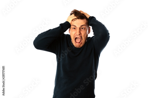 emotional portrait of a crazy man in close-up. concept: the nervous breakdown, mental disease, headaches and migraine. isolated on white background.