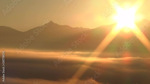 Wallpaper Mural Timelapse of thick fog flowing past Mount Tokachi at sunrise Torontodigital.ca