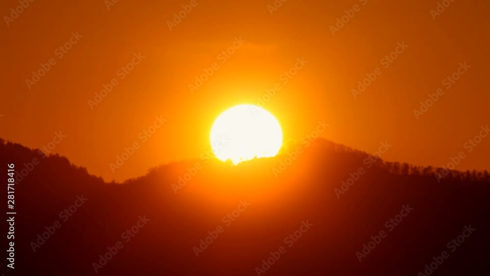 Timelapse shot of sunrise over mountain, Koshimizu, Hokkaido Timelapse shot of sunrise over mountain, Koshimizu, Hokkaido