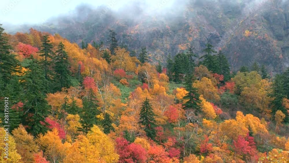 Lockdown shot of Tokachidake Onsen hills in autumn Lockdown shot of Tokachidake Onsen hills in autumn