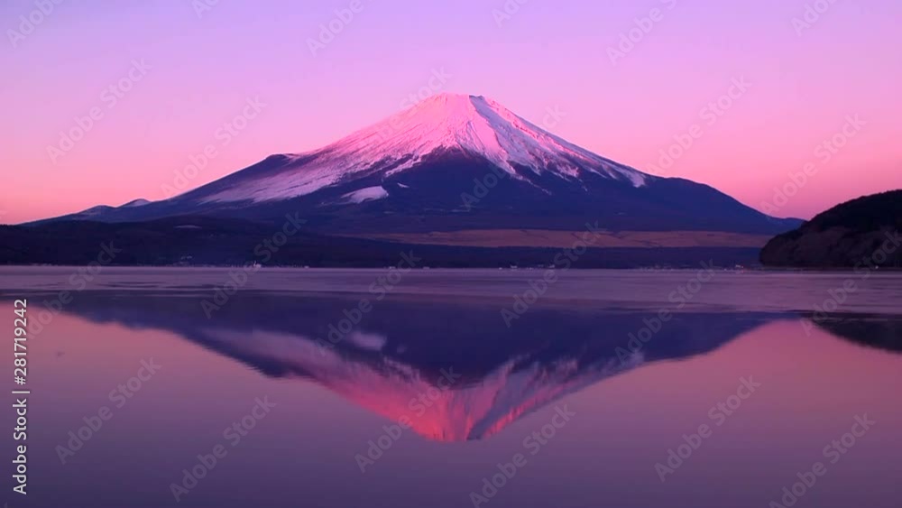 Timelapse of Mount Fuji reflecting in Lake Yamanaka at pink dawn Timelapse of Mount Fuji reflecting in Lake Yamanaka at pink dawn