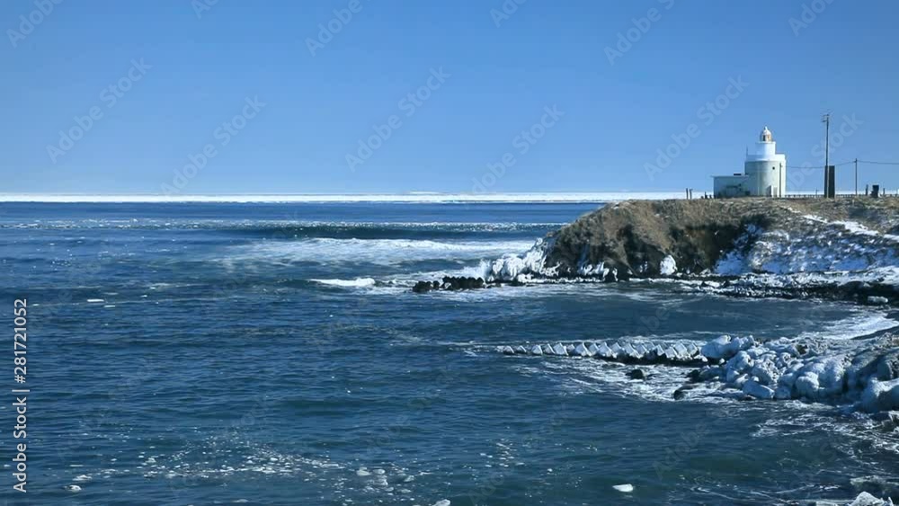 View of lighthouse on coastline in winter, Nemuro, Hokkaido, Japan View of lighthouse on coastline in winter, Nemuro, Hokkaido, Japan