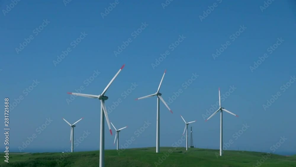 Zoom shot of wind turbines on summer day, Wakkanai, Hokkaido Zoom shot of wind turbines on summer day, Wakkanai, Hokkaido