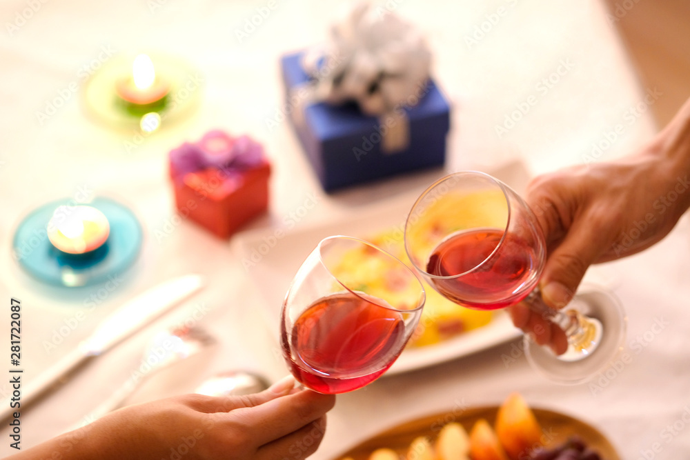 Hand of group friends celebrate successfully with red wine in the party. Young toasting in party and drinking after work hard for relax and be enjoy. Celebration Concept , Cheers! Hand of group friends celebrate successfully with red wine in the party. Young toasting in party and drinking after work hard for relax and be enjoy. Celebration Concept , Cheers!