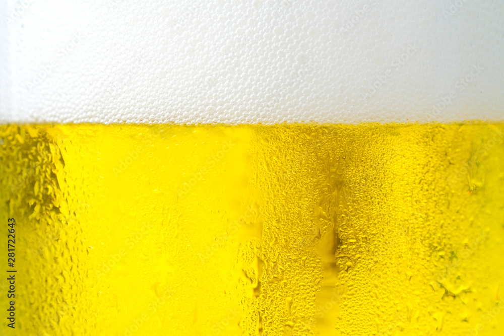 Cool beers with beer bubbles on top a glass at the party or congratulations party or holiday , weekend time , relax time. A man pouring fresh beer. Party Time at Pub and Restaurant Concept. Cool beers with beer bubbles on top a glass at the party or congratulations party or holiday , weekend time , relax time. A man pouring fresh beer. Party Time at Pub and Restaurant Concept.