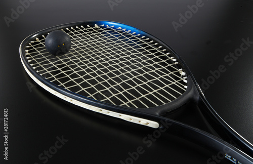 badminton racket and shuttlecock on strings © goh