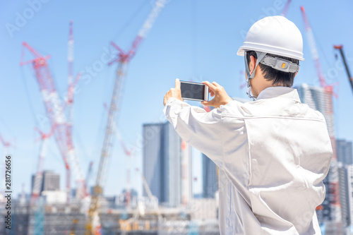 Naklejka asian engineer worker working in construction site