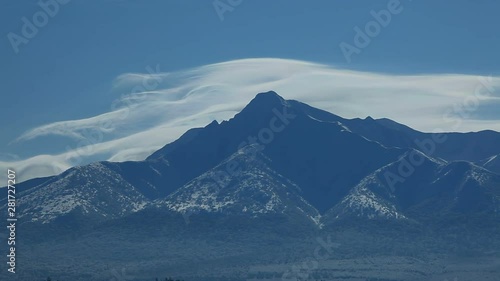 Timelapse of clouds flowing over Mount Shari, Japan photo