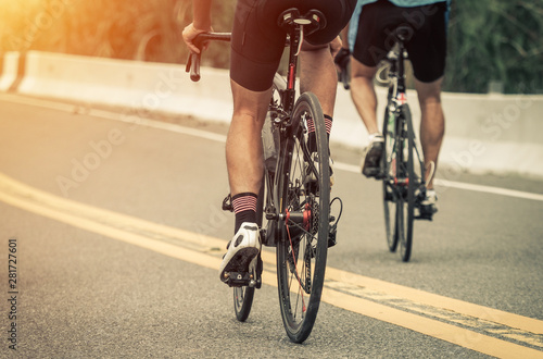 Cycling competition, close up cyclist athletes riding a race