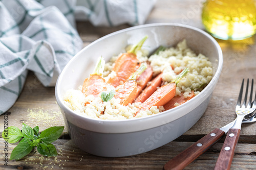 Young carrots baked with Pravanese herbs. couscous Sour cream, yogurt or fresh cream.