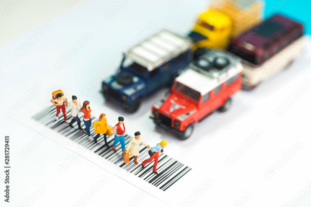 Miniature toys a group of women crossing a road - road safety concept. Miniature toys a group of women crossing a road - road safety concept.