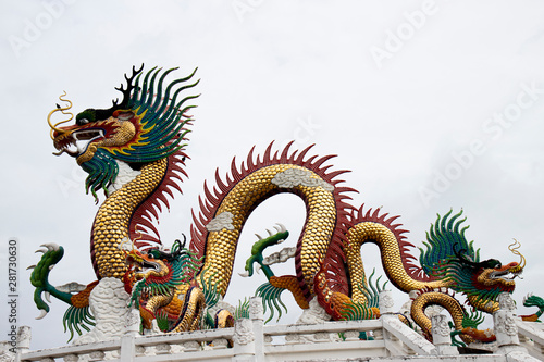 Wallpaper Mural Chinese golden dragon statue isolated on white background. Torontodigital.ca