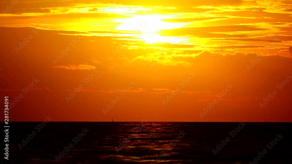 sunset orange yellow sky and red cloud moving on sea sunset orange yellow sky and red cloud moving on sea