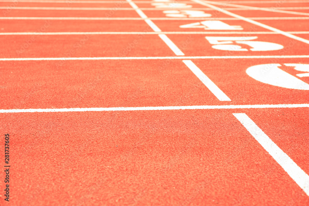 Start of red athletic track with numbers, space for text