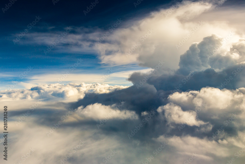 Fototapeta premium blue sky with the clouds from the plane view