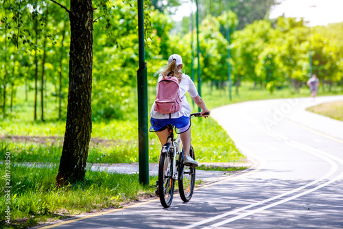  Cyclist ride on the bike path in the city Park 