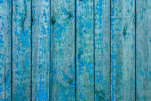 Old painted wooden boards. Old wooden fence. Background.
