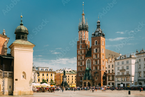 Krakow, Poland. Cloth Hall Building And St. Mary's Basilica. Famous Old Landmark Church Of Our Lady Assumed Into Heaven. Saint Mary's Church. UNESCO World Heritage Site