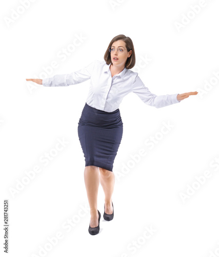 Balancing young businesswom...