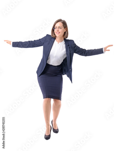 Balancing young businesswom...