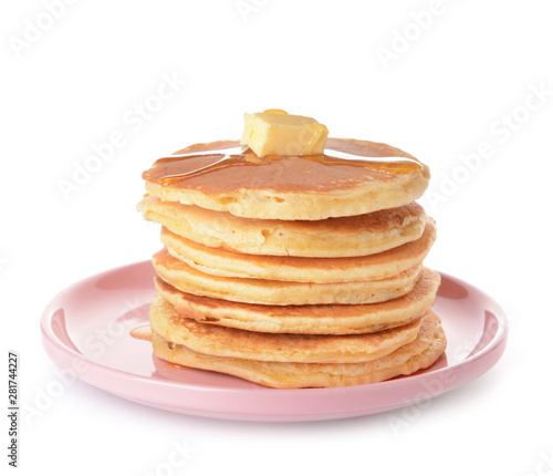 Tasty pancakes with butter on white background