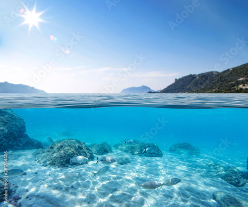 Underwater sea and blue sky and island.