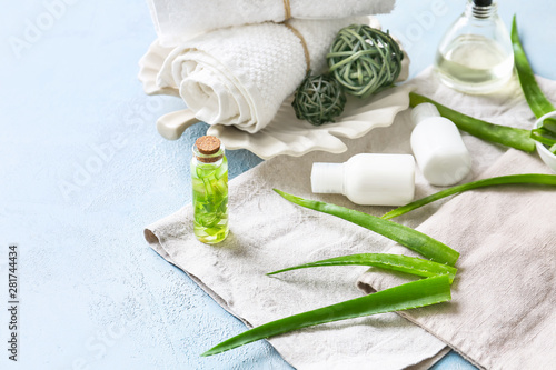 Spa composition with aloe vera on color background