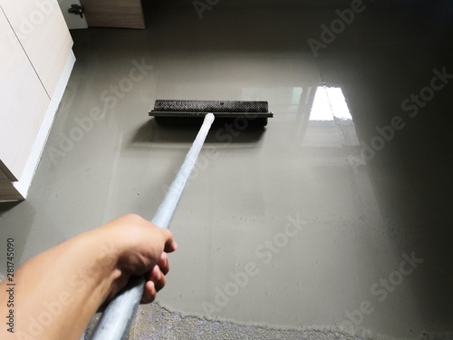 Self-leveling concrete is typically used to create a flat and smooth surface with a compressive strength similar to or higher than that of traditional concrete prior to installing interior floor.