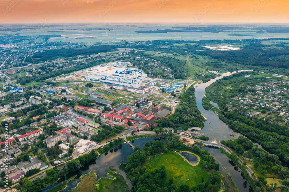 Dobrush, Gomel Region, Belarus. Aerial View Of Old And Modern Paper Factory. Historical Heritage In Bird's-eye View