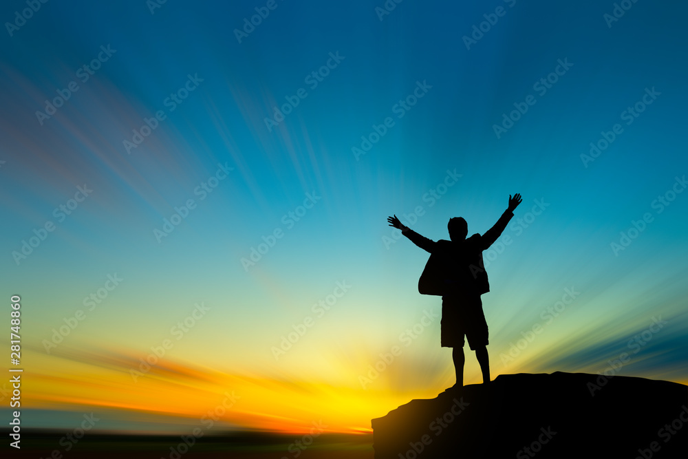 silhouette of man on mountain top over sky and sun light background,business, success, leadership, achievement and people concept silhouette of man on mountain top over sky and sun light background,business, success, leadership, achievement and people concept