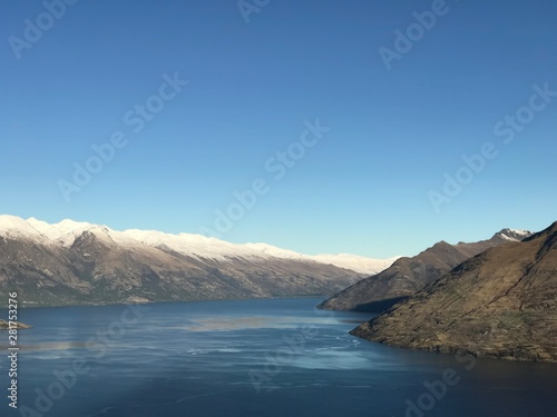 Remarkable ski field heavy snow thick layer on top mountain people ski with snowboard and lift beautiful vacation winter time extremely cold mountain range Otago