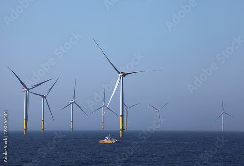 Wind farm offshore. Sustainable green energy.
