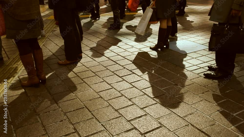 Low section view of pedestrians walking on street, Japan Low section view of pedestrians walking on street, Japan