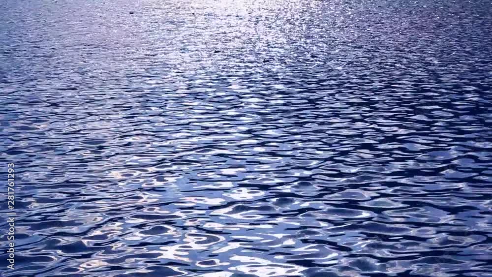 Sunlight reflecting in Lake Tanuki waters, Japan Sunlight reflecting in Lake Tanuki waters, Japan
