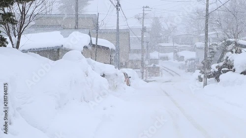 Street in city in winter, Yokote, Akita Prefecture, Japan photo