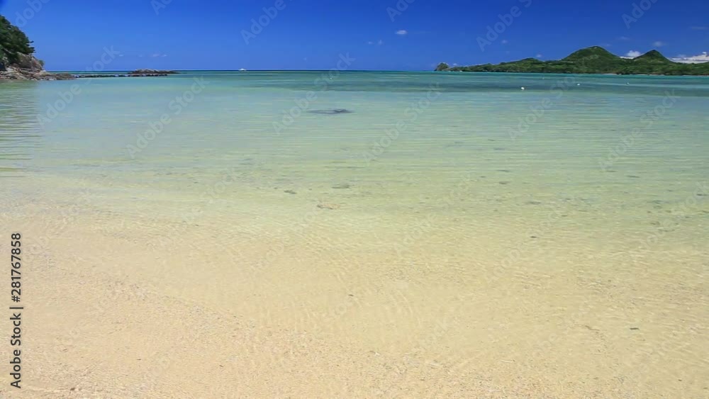 Beach and island in sea, Ishigaki, Okinawa Prefecture, Japan Beach and island in sea, Ishigaki, Okinawa Prefecture, Japan