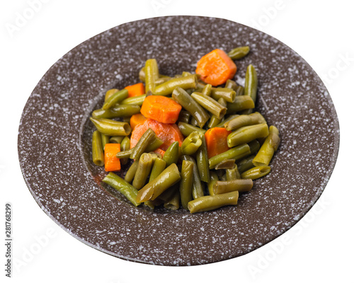 green beans with garlicand carrots  on a plate isolated on white background.green beans with carrot top view. healthy  food photo