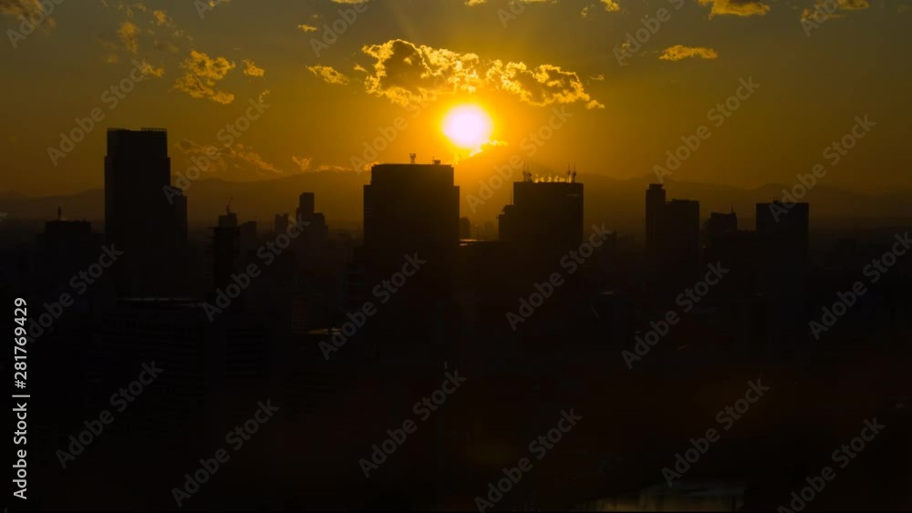 Timelapse view of city at sunset Timelapse view of city at sunset