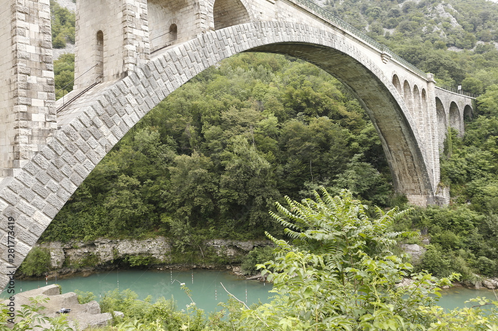 Fototapeta premium Solkan stone railway bridge in Slovenia over the river Soсa