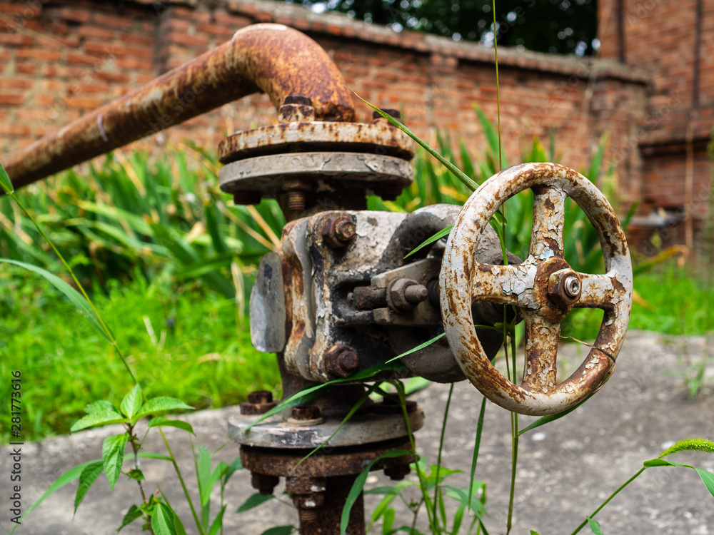 Rusty faucet on the pipe. Water pressure supply Rusty faucet on the pipe. Water pressure supply