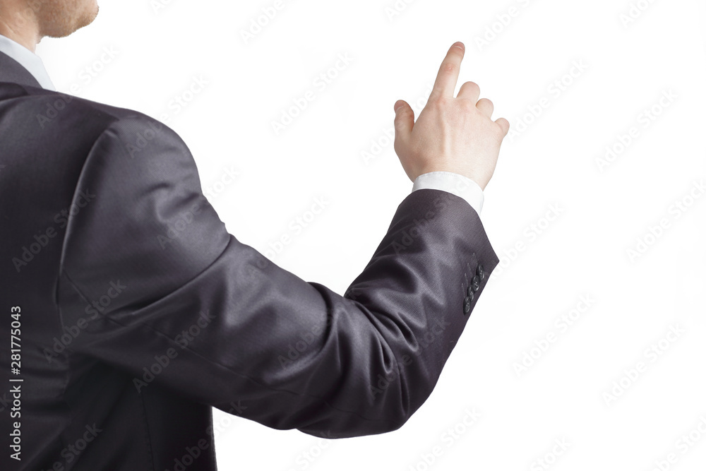 rear view. hand of a businessman pointing at a copy space rear view. hand of a businessman pointing at a copy space