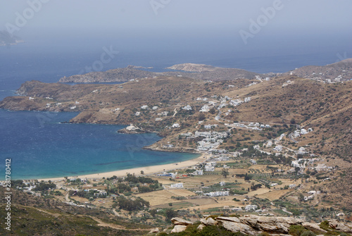 Greece, the holiday island of Ios. A view of Mylopotos beach from the surrounding mountains on a summers day